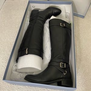 Women’s black leather boots with gold buckles by Ever Lane